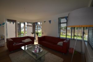 drijvers-oisterwijk-nieuwbouw-woonhuis-zitkamer-interieur-modern-hout-licht (21)