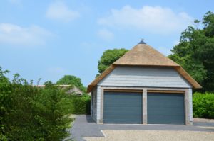 drijvers-oisterwijk-nieuwbouw-villa-riet-hout-bakstenen-garage-bijgebouw (26)