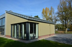 drijvers-oisterwijk-nieuwbouw-exterieur-zink-gevel-dak-strak-modern-bakstenen-deur-raam-pui (12)