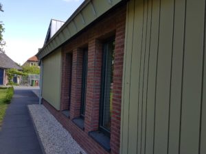 drijvers-oisterwijk-nieuwbouw-exterieur-zink-gevel-dak-strak-modern-bakstenen-deur-raam-pui (3)
