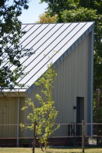 drijvers-oisterwijk-nieuwbouw-exterieur-zink-gevel-dak-strak-modern-bakstenen-deur-raam-pui (4)-min