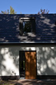 drijvers-oisterwijk-exterieur-particulier-woonhuis-villa-wit-stucwerk-zwart-kozijn-hout-spant-pannendak-dakkapel-modern (4)